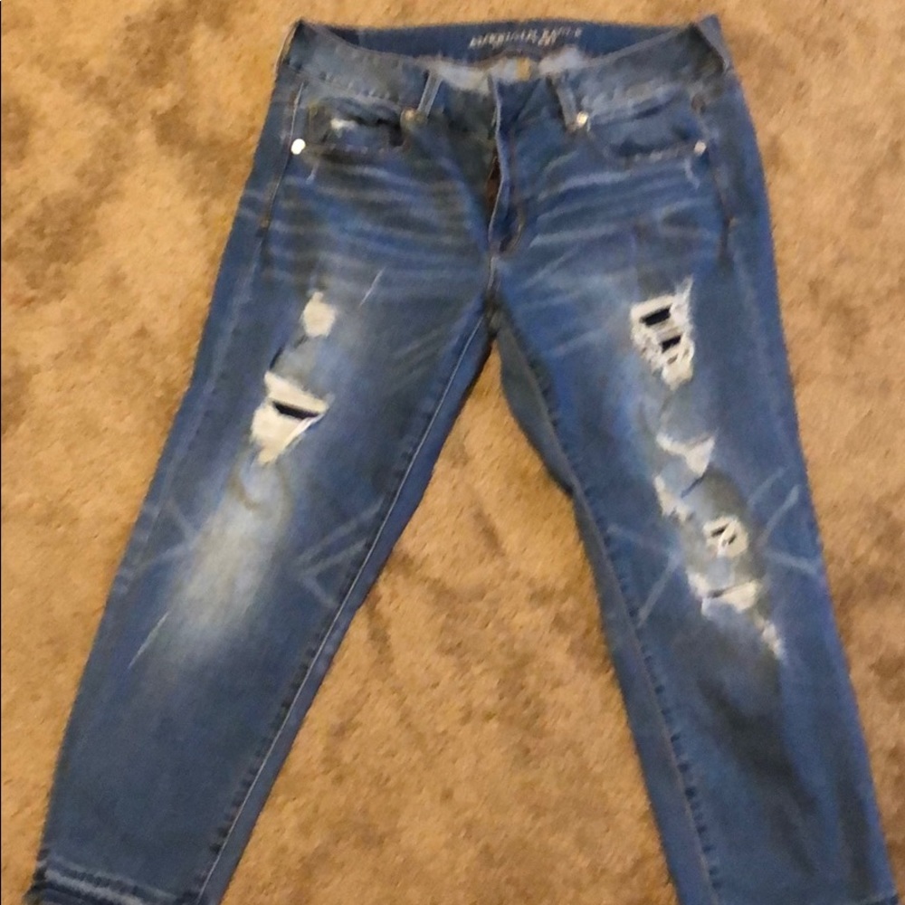 Distressed ankle pants with lining behind holes